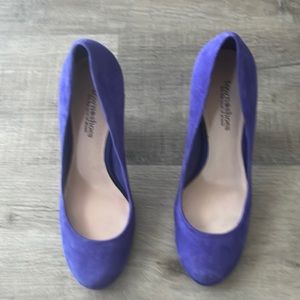 A pair of heels. The colour is blueish purple from Town & Shoes